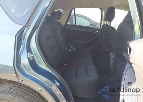 2015 Mazda Cx-5 Touring z USA, uszkodzony, nr VIN JM3KE2CY5F0471018